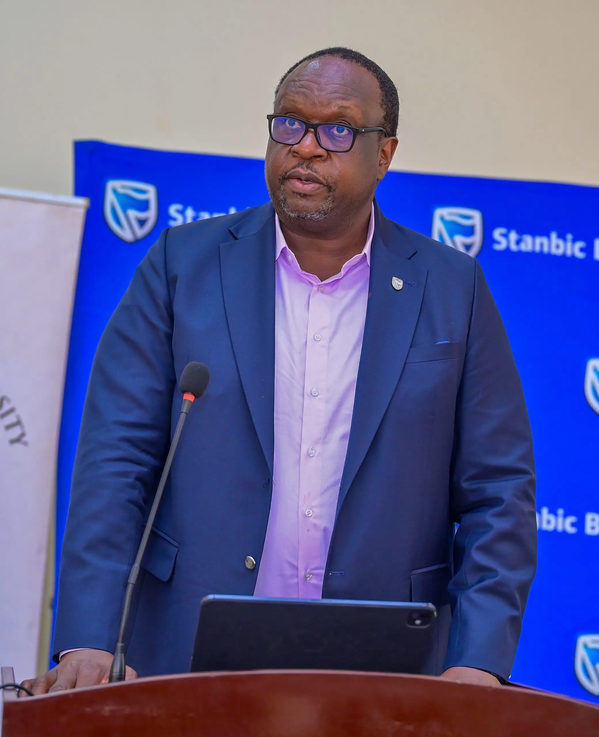 Mumba Kalifungwa, the Stanbic Bank Chief Executive making remarks during the donation handover at Kabale University Mumba Kalifungwa, the Stanbic Bank Chief Executive making remarks during the donation handover at Kabale University