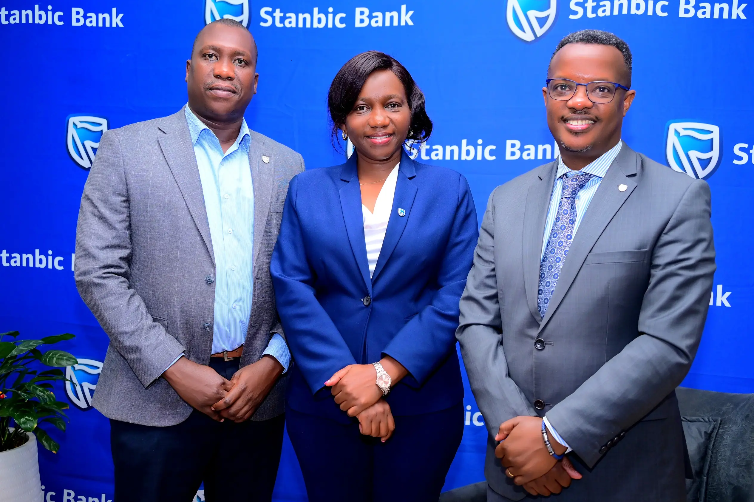Sam Bulenzi (R) Stanbic Bank Head of Coverage with Sophia Nakazibwe Head Fraud Risk and Stephen Adatu from Uganda Bankers Association during the launch in Kampala Sam Bulenzi (R) Stanbic Bank Head of Coverage with Sophia Nakazibwe Head Fraud Risk and Stephen Adatu from Uganda Bankers Association during the launch in Kampala