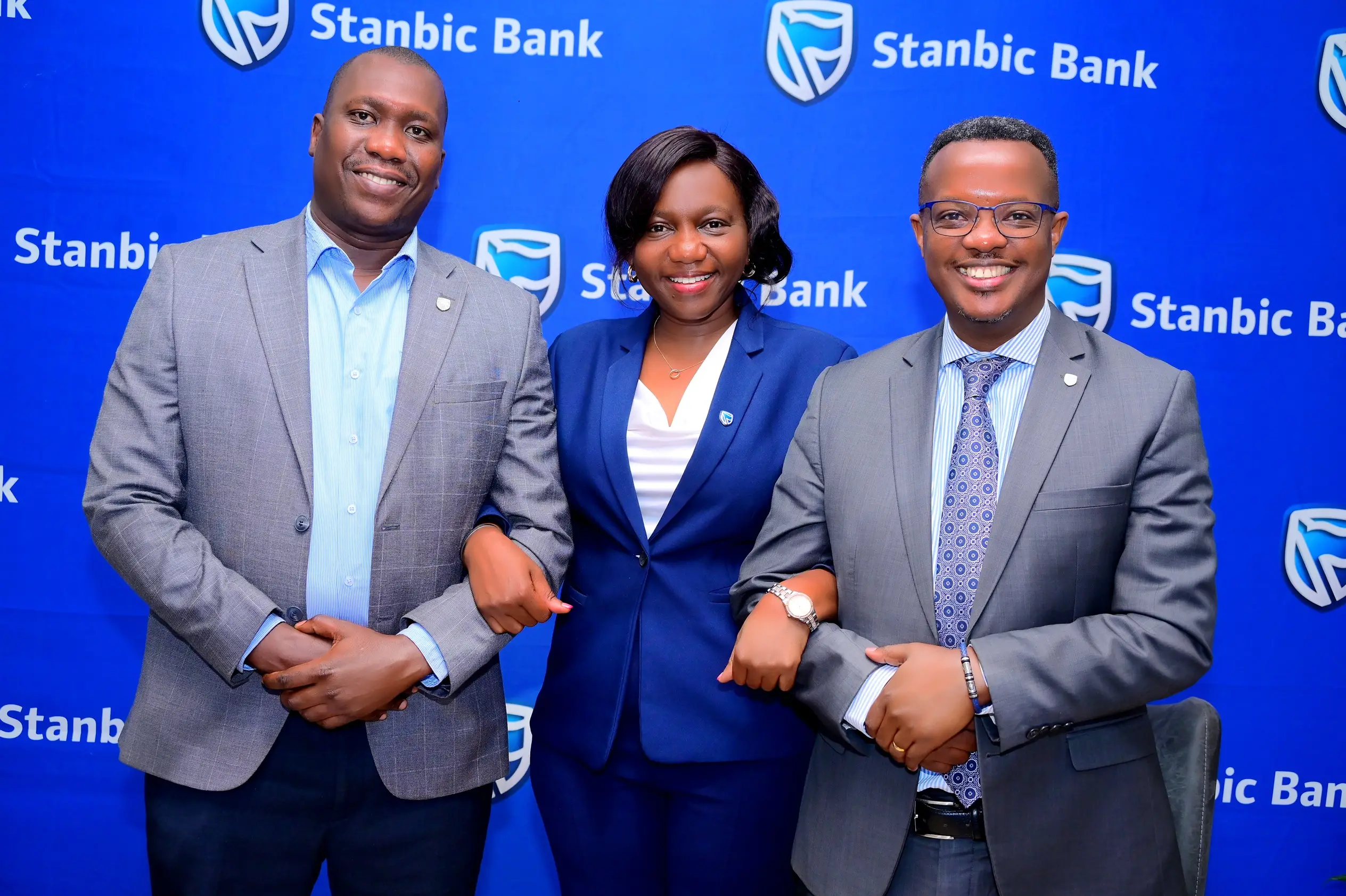 Sam Bulenzi (R) Stanbic Bank Head of Coverage with Sophia Nakazibwe Head Fraud Risk and Stephen Adatu from Uganda Bankers Association Sam Bulenzi (R) Stanbic Bank Head of Coverage with Sophia Nakazibwe Head Fraud Risk and Stephen Adatu from Uganda Bankers Association