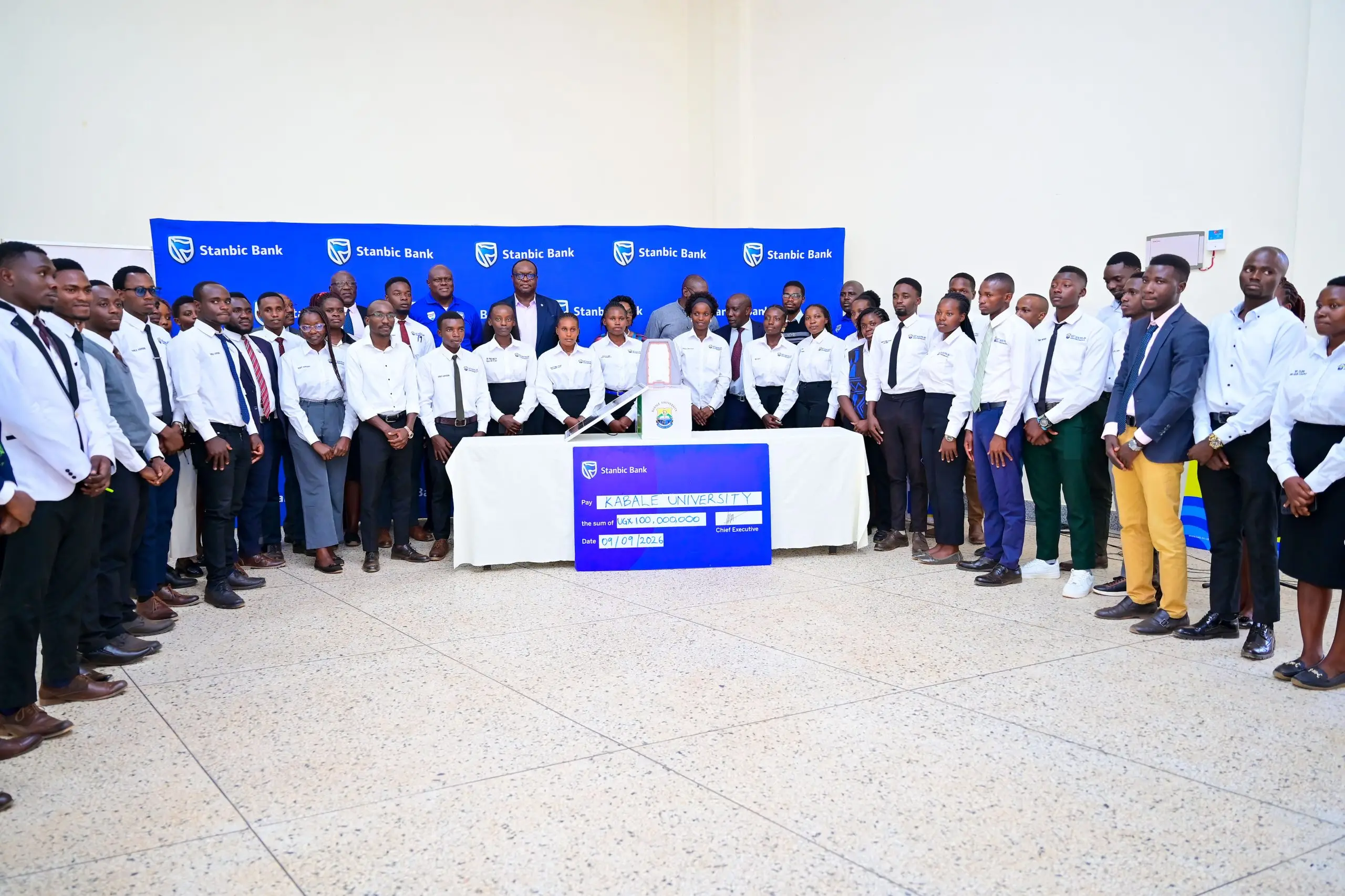 to SUHL Chief Executive Mark Ocitti Ongom and Stanbic Bank boss Mumba Kalifungwa pose for a group photo with Kabale University Students Guild Counsel (1) to SUHL Chief Executive Mark Ocitti Ongom and Stanbic Bank boss Mumba Kalifungwa pose for a group photo with Kabale University Students Guild Counsel (1)